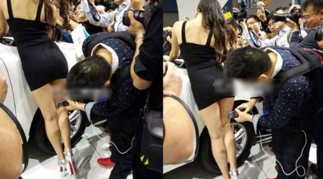 组图:广东车展现不文明拍照行为 毒男偷拍车模